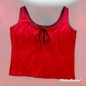 Red tank top with black trim and tie in front size L
